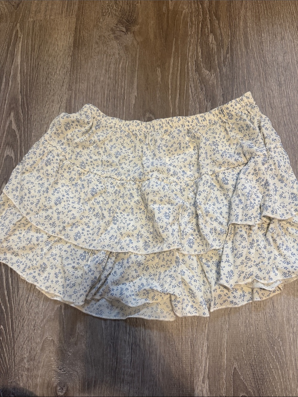 Brandy Melville cream skirt with blue floral print
